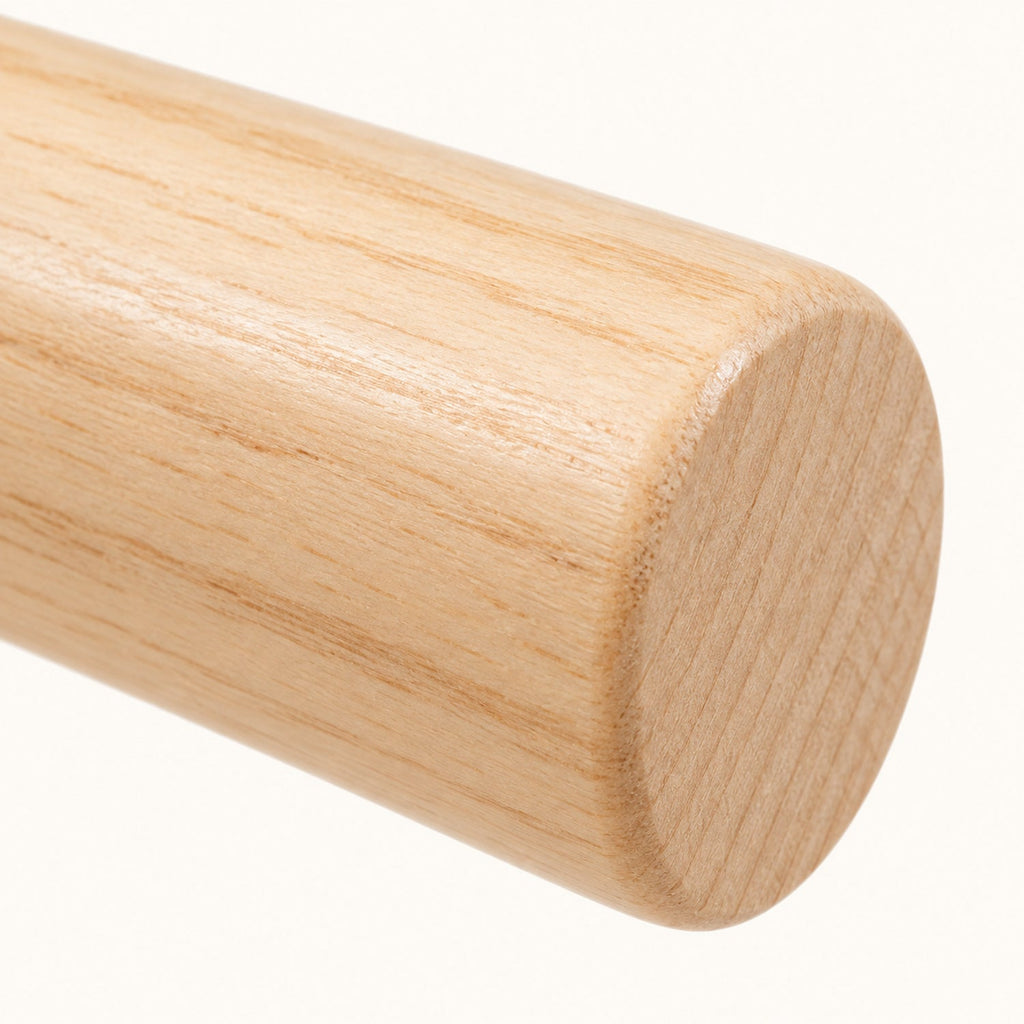 Portique d'éveil en bois avec suspensions — dès la naissance